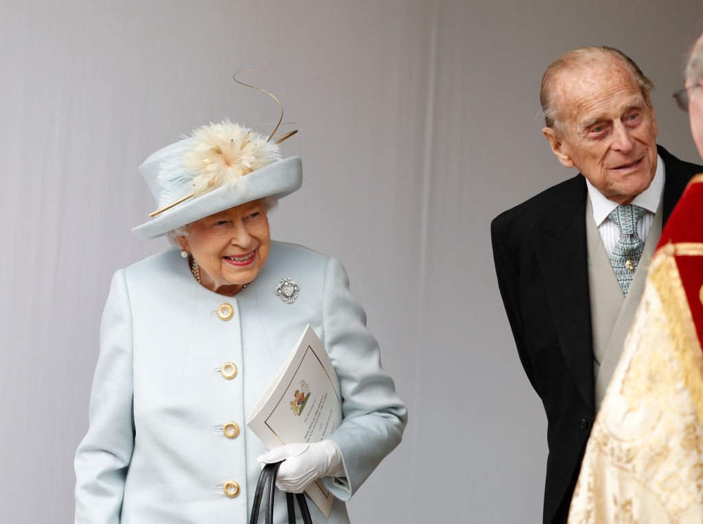 Image Credit: Getty Images / Queen Elizabeth II and Prince Philip, Duke of Edinburgh look on after the wedding of Princess Eugenie of York on October 12, 2018 in Windsor, England. Image Credit: Getty Images / Queen Elizabeth II and Prince Philip, Duke of Edinburgh look on after the wedding of Princess Eugenie of York on October 12, 2018 in Windsor, England.