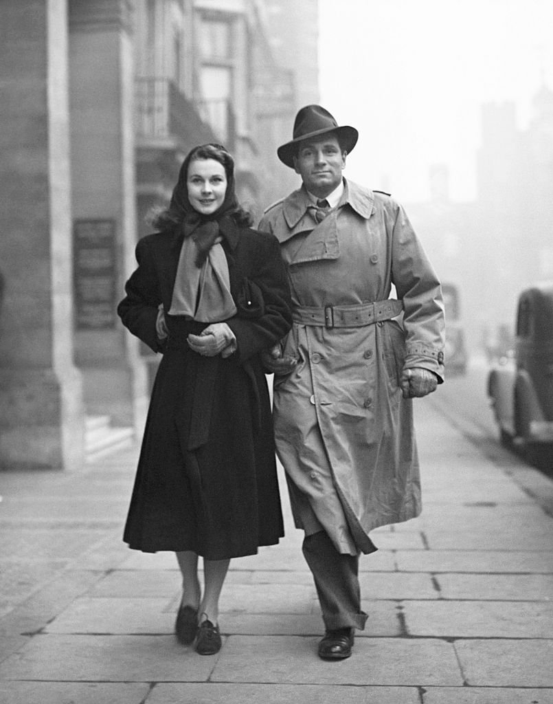 Image Credits: Getty Images / Hulton-Deutsch Collection/CORBIS | Vivien Leigh and Laurence Olivier walking down the street together