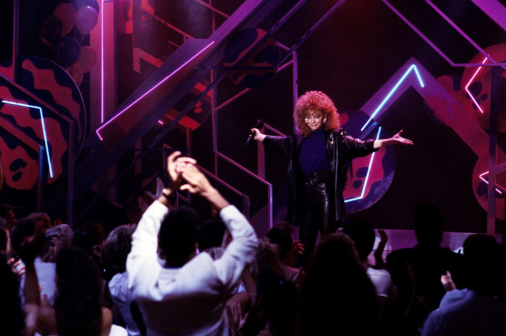 Image Credits: Getty Images / ABC Photo Archives | Reba performing