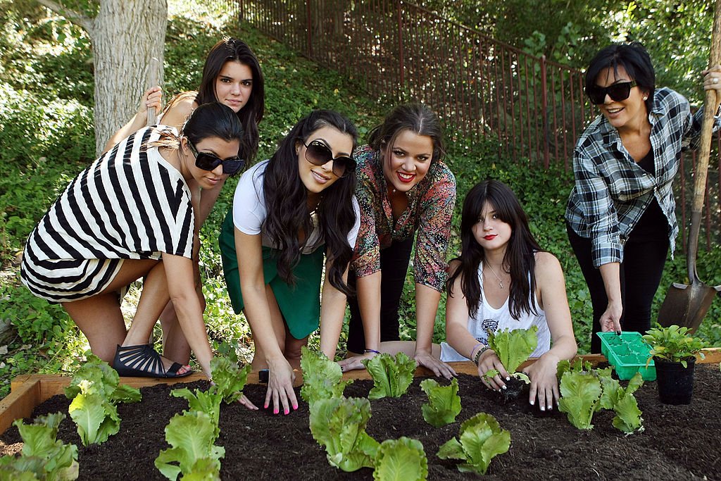 Image Credit: Getty Images / The Kardashians plant a vegetable garden at their family home on August 6, 2009 in Los Angeles, California.