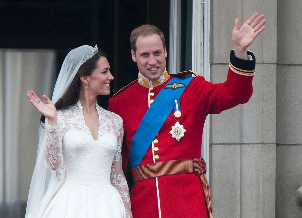 Image Credit: Getty Images / TRH Catherine, Duchess of Cambridge and Prince William, Duke of Cambridge on the balcony at Buckingham Palace, following their wedding at Westminster Abbey on April 29, 2011 in London, England.