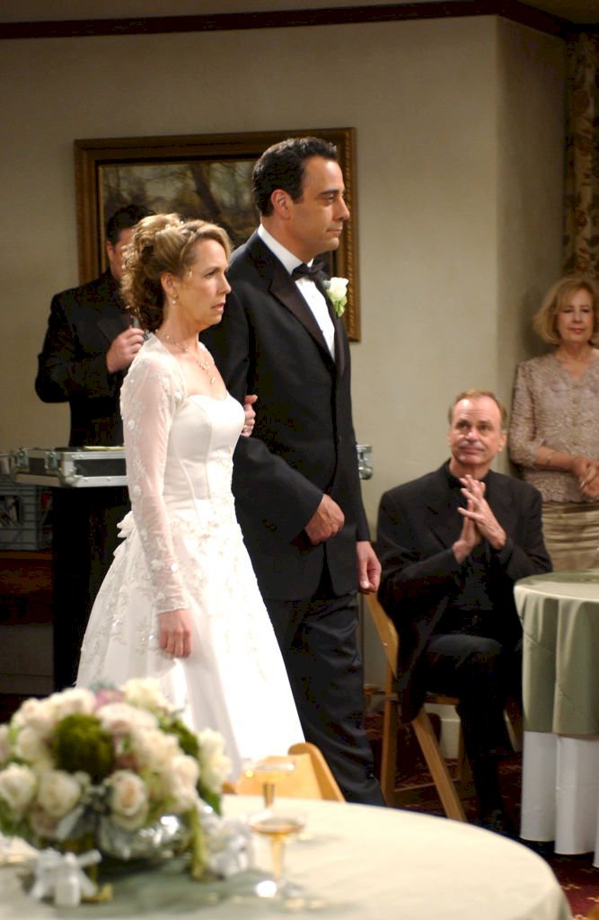 Image Credits: Getty Images / 'Robert's Wedding' - Brad Garrett and Monica Horan in Everybody Loves Raymond