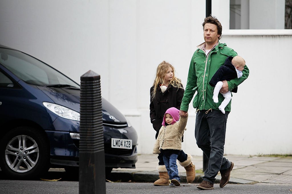 Image Credit: Getty Images / Jamie Oliver with his three young children Petal Blossom, Daisy Boo and Buddy Bear are seen on March 13, 2011 in London, United Kingdom.