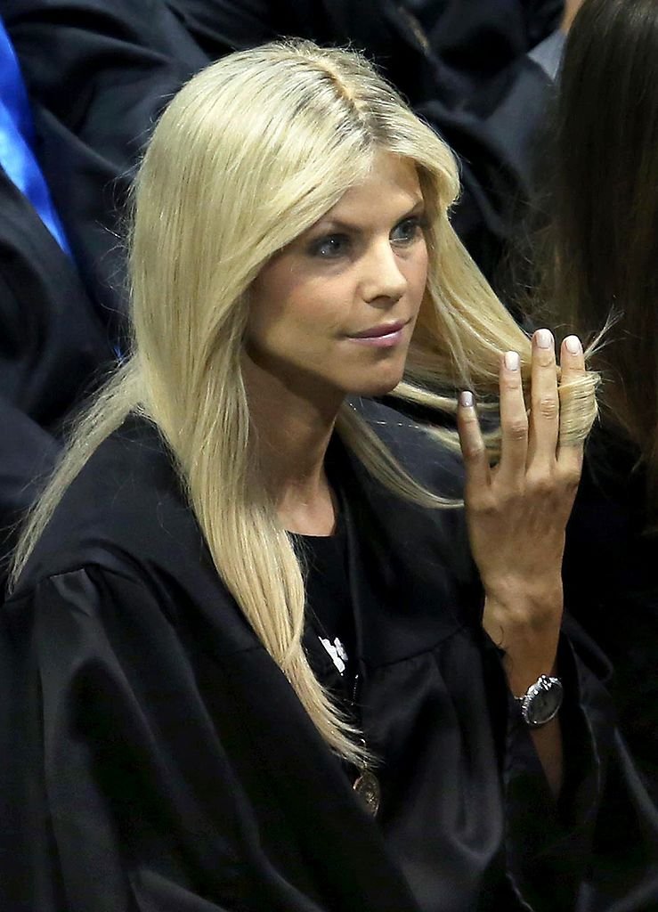 Image Credits: Getty Images / Stephen M. Dowell / Orlando Sentinel / Tribune News Service | Elin Nordegren twirls her hair during commencement ceremonies at Rollins College in Winter Park, Fla., Saturday, May 10, 2014. Nordegren, the former wife of golfer Tiger Woods, was named the "Outstanding Graduating Senior" for Rollins College. Image Credits: Getty Images / Stephen M. Dowell / Orlando Sentinel / Tribune News Service | Elin Nordegren twirls her hair during commencement ceremonies at Rollins College in Winter Park, Fla., Saturday, May 10, 2014. Nordegren, the former wife of golfer Tiger Woods, was named the "Outstanding Graduating Senior" for Rollins College.