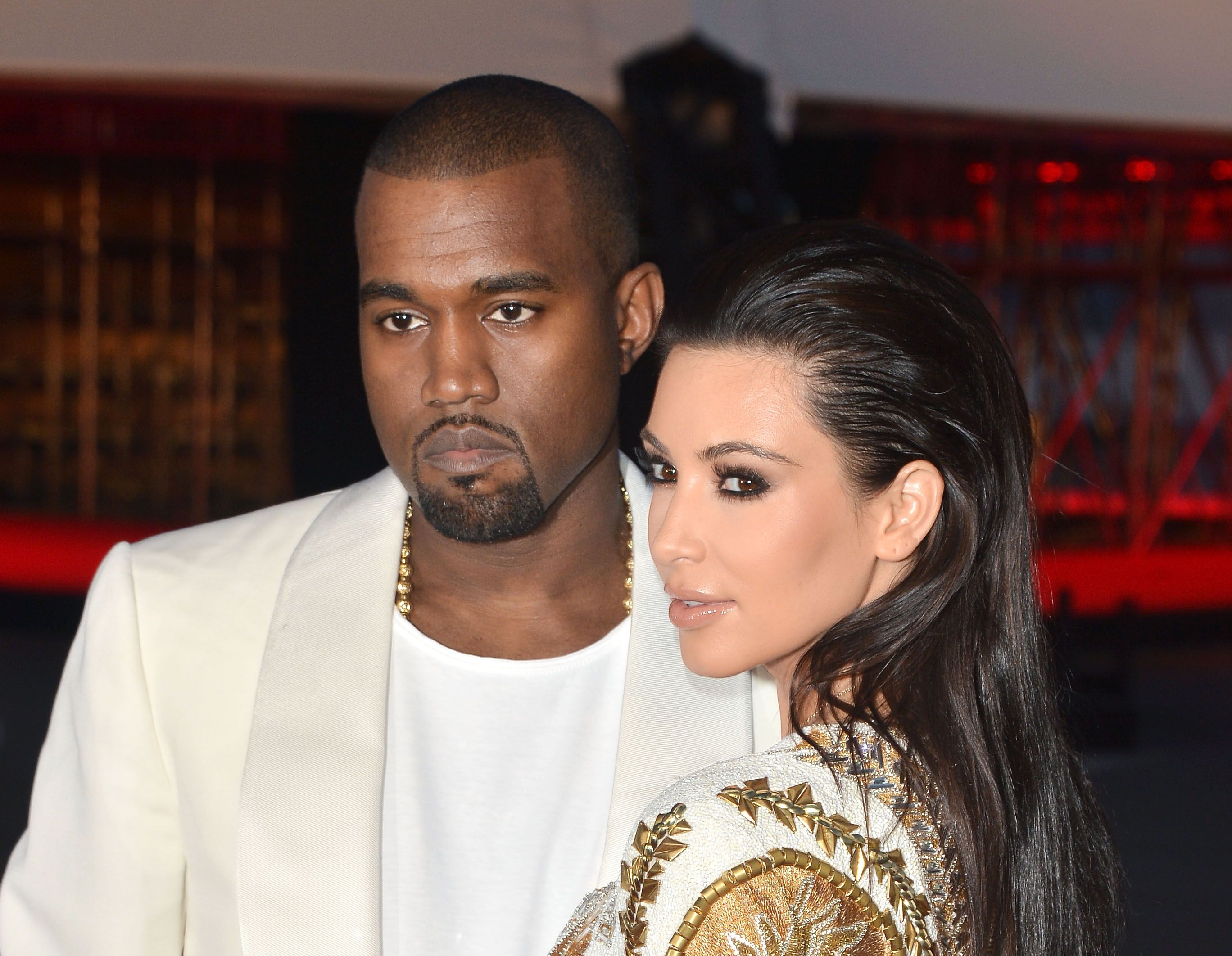 Kanye West and Kim Kardashian attend the "Cruel Summer" Premiere / Getty Images Kanye West and Kim Kardashian attend the "Cruel Summer" Premiere / Getty Images