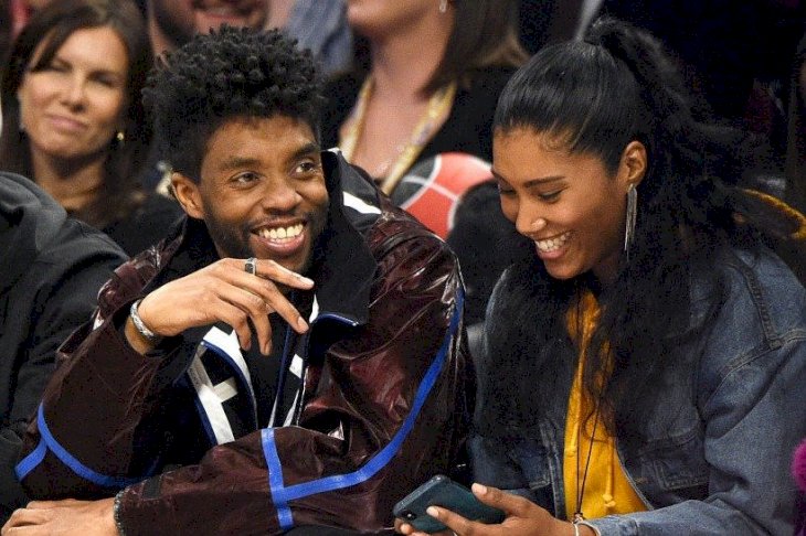 Image Credits: Getty Images / Chadwick Boseman and Taylor Simone Ledward at 69th NBA All-Star Game