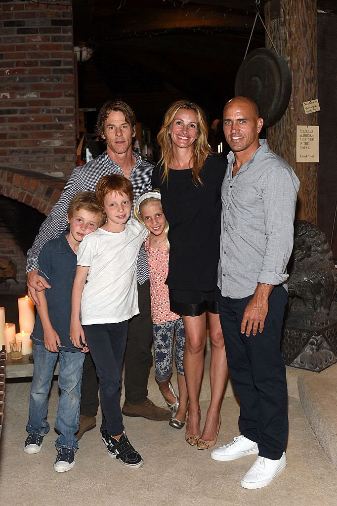 Image Credits: Getty Images / Stefanie Keenan | Daniel Moder, Julia Roberts, Kelly Slater, Phinnaeus Moder, Henry Daniel Moder and Hazel Moder attend Kelly Slater, John Moore and Friends Celebrate the Launch of Outerknown at Private Residence on August 29, 2015 in Malibu, California.