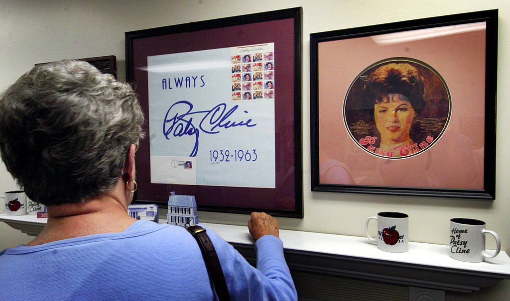 Image Credit: Getty Images / Patsy Cline town history tour and a framed collection of Patsy Cline commemorative stamps.