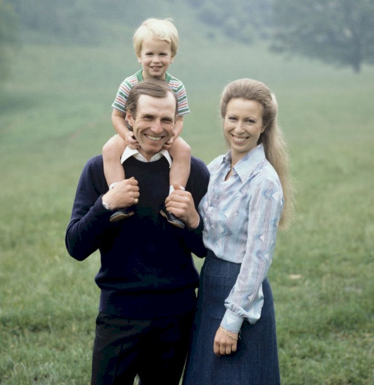 Image Credits: Getty Images / Lichfield Archive | HRH The Princess Anne with Captain Mark Phillips and Peter Phillips in the grounds of their home at Gatcombe Park, Gloucestershire on 10th June 1980. Image Credits: Getty Images / Lichfield Archive | HRH The Princess Anne with Captain Mark Phillips and Peter Phillips in the grounds of their home at Gatcombe Park, Gloucestershire on 10th June 1980.