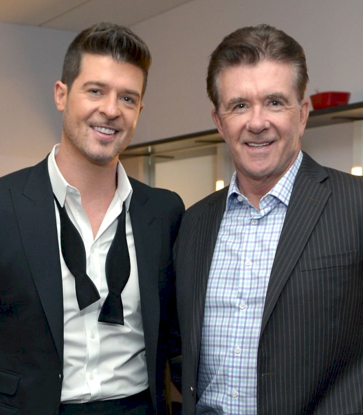 Image Credits: Getty Images / Charley Gallay / WireImage | Recording artist Robin Thicke and actor Alan Thicke attend The GRAMMY Nominations Concert Live!! Countdown to Music's Biggest Night at Nokia Theatre L.A. Live on December 6, 2013 in Los Angeles, California.
