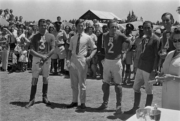Image Credit: Getty Images/Hulton Archive/Anwar Hussein | Prince Charles & Andrew Parker Bowles playing Polo in Kenya.