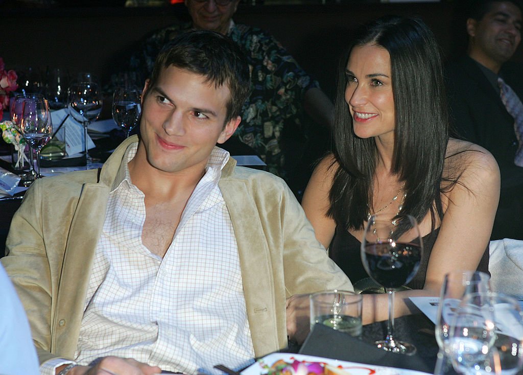 Image Credits: Getty Images / Chris Polk / FilmMagic | Ashton Kutcher and Demi Moore during Ubid.com Joins Forces with Hollywood Stars to Launch Celebrity Auction to Benefit Hurricane Victims - Inside at Empire Ballroom in Las Vegas, Nevada, United States.