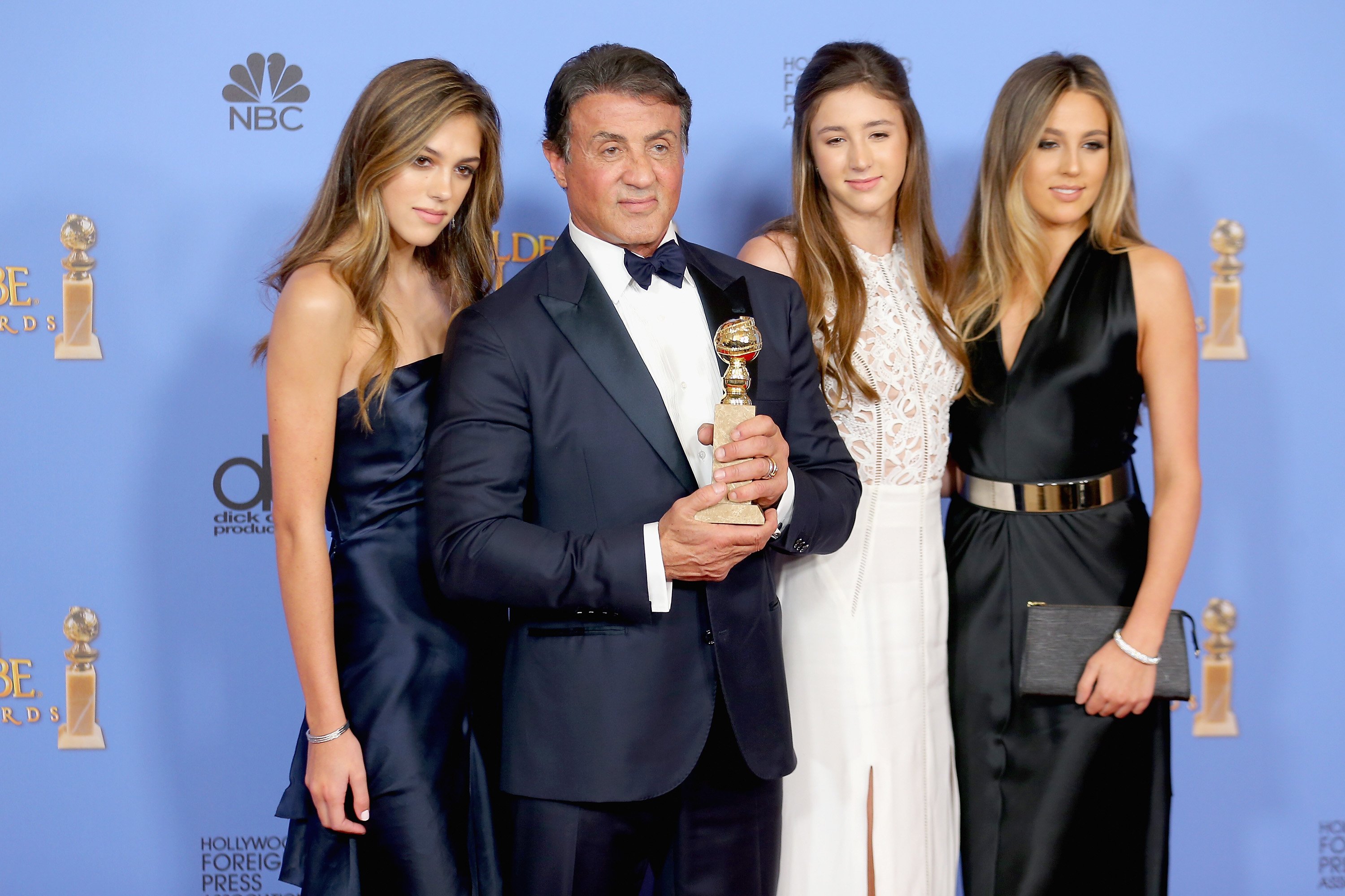 Image Source: Getty Images/Mark Davis | Stallone and his daughters at the 73rd Golden Globe Awards