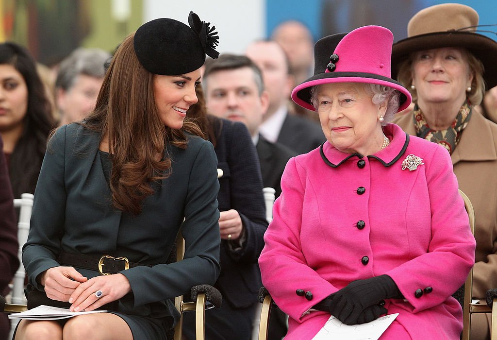 Image Credit: Getty Images / Queen Elizabeth II (R) and Catherine, Duchess of Cambridge (L) watch a fashion show at De Montfort University on March 8, 2012 in Leicester, England.