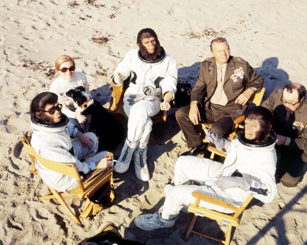 Actors Roddy McDowall as Cornelius, Kim Hunter as Zira, Natalie Trundy as Dr. Stephanie Branton, Harry Lauter as General Winthrop and Sal Mineo as Milo in the science-fiction film 'Escape from the Planet of the Apes', 1971 | Image Source: Getty Images