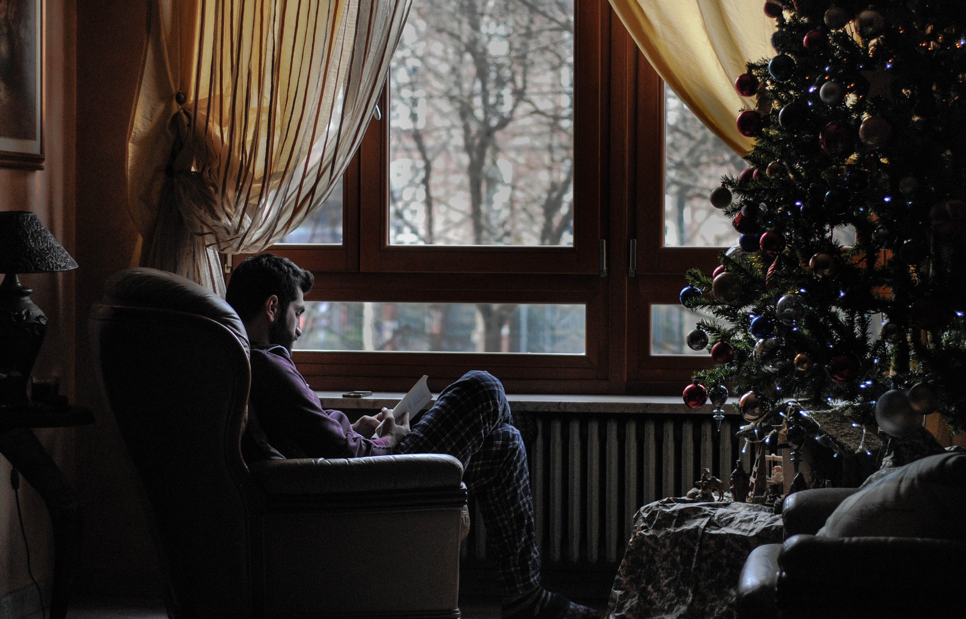 A man lonely at Christmas time | Unsplash A man lonely at Christmas time | Unsplash