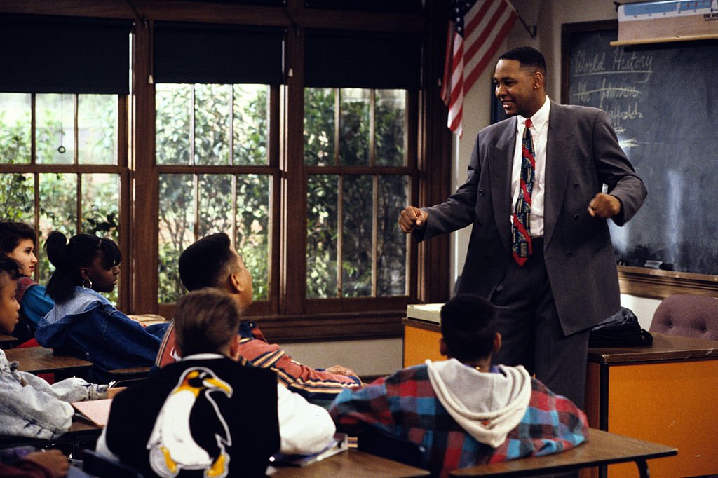 Image Credits: Getty Images / Walt Disney Television | Mark Curry (as Mr. Cooper) stars in the T.V series "Hanging with Mr. Cooper." A single high school teacher and basketball coach living in Oakland, California. Image Credits: Getty Images / Walt Disney Television | Mark Curry (as Mr. Cooper) stars in the T.V series "Hanging with Mr. Cooper." A single high school teacher and basketball coach living in Oakland, California.