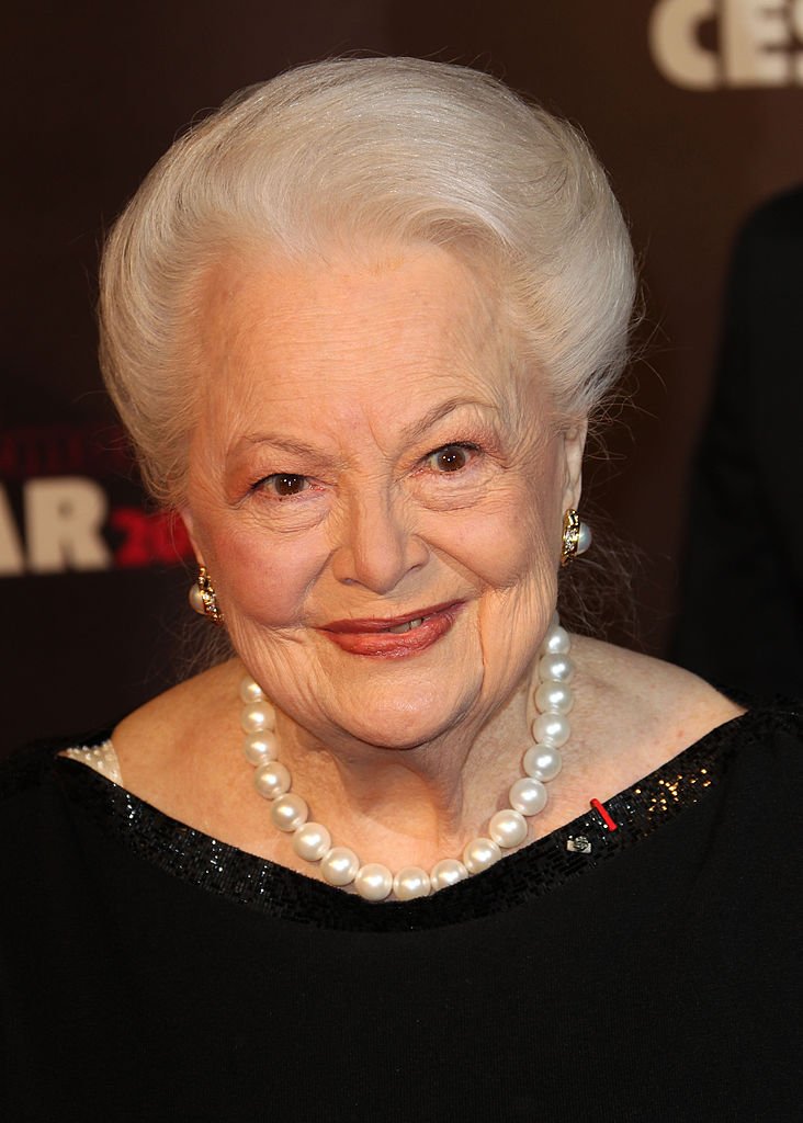 Image Credits: Getty Images / Toni Anne Barson | Olivia de Havilland arrives at the 36th Cesar Awards at Theatre du Chatelet Image Credits: Getty Images / Toni Anne Barson | Olivia de Havilland arrives at the 36th Cesar Awards at Theatre du Chatelet
