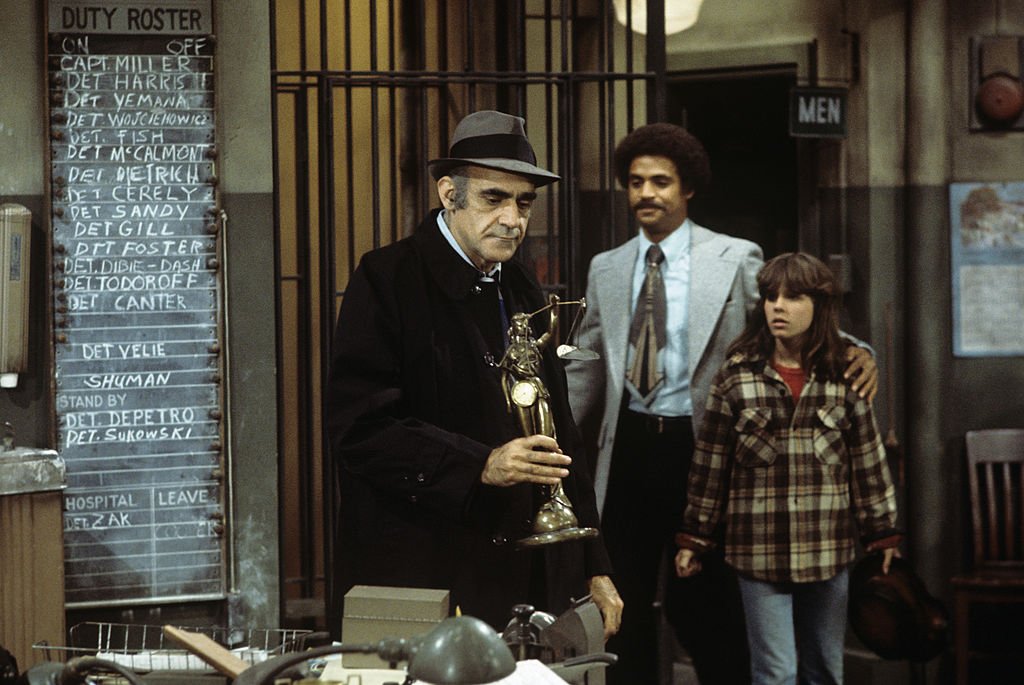Image Credit: Getty Images / Abe Vigoda, Ron Glass, Denise Miller on set for Barney Miller. Image Credit: Getty Images / Abe Vigoda, Ron Glass, Denise Miller on set for Barney Miller.