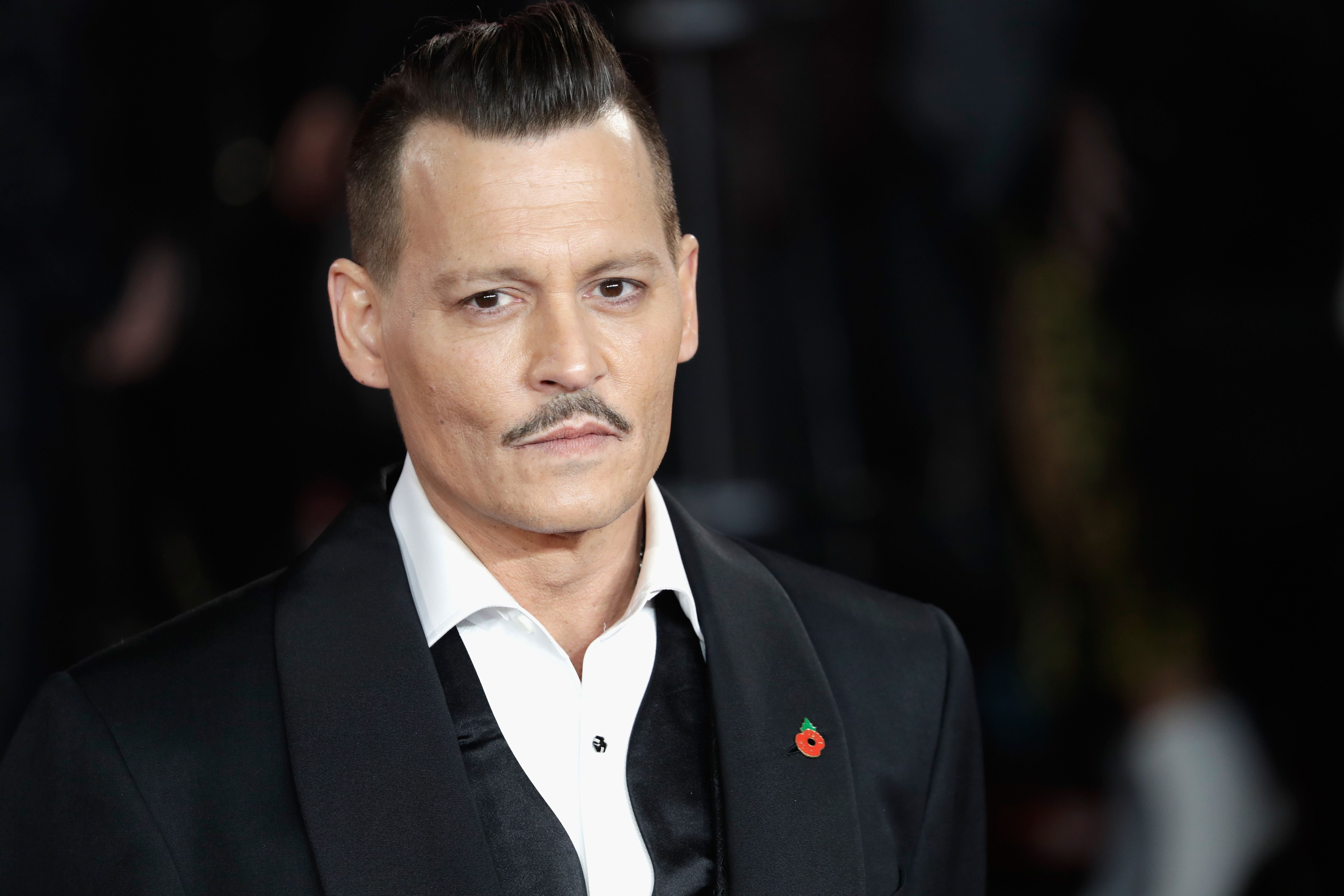Johnny Depp at the World Premiere of Murder in Orient Express / Getty Images