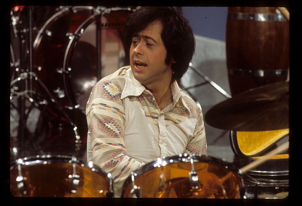 Image Credit: Getty Images / Wayne Osmond plays drums for his siblings in April 2, 1976.