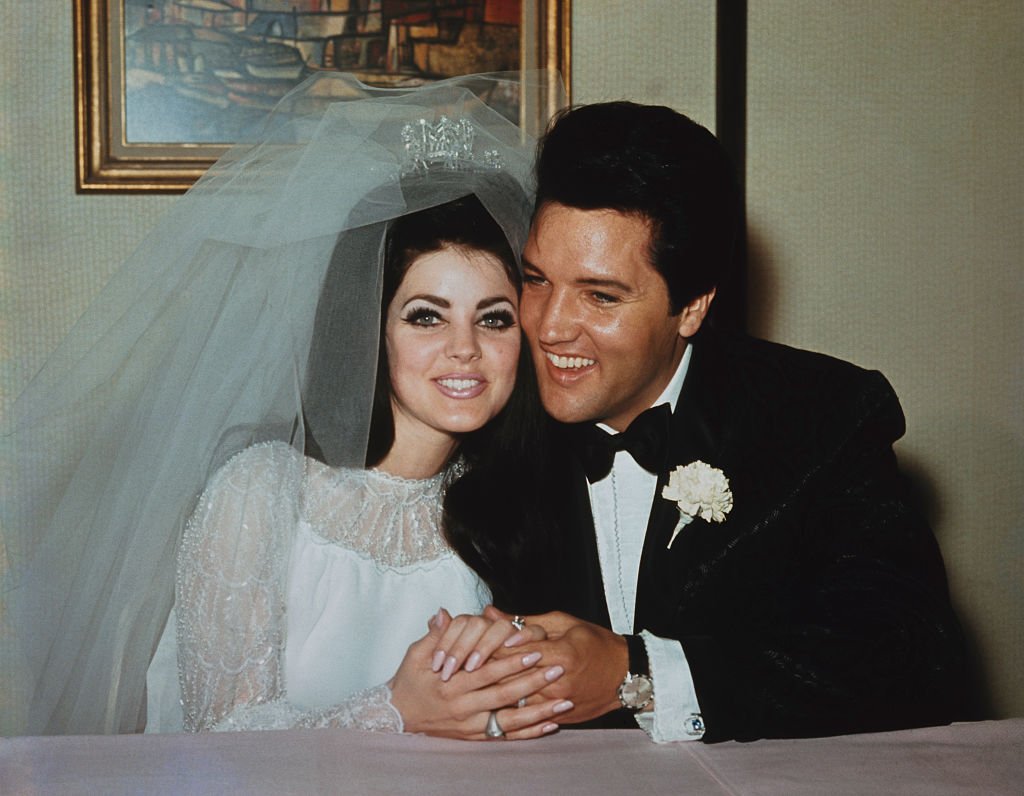 Image Source: Getty Images/Popperfoto via Getty Images/Rolls Press | Elvis and Priscilla on their wedding day Image Source: Getty Images/Popperfoto via Getty Images/Rolls Press | Elvis and Priscilla on their wedding day