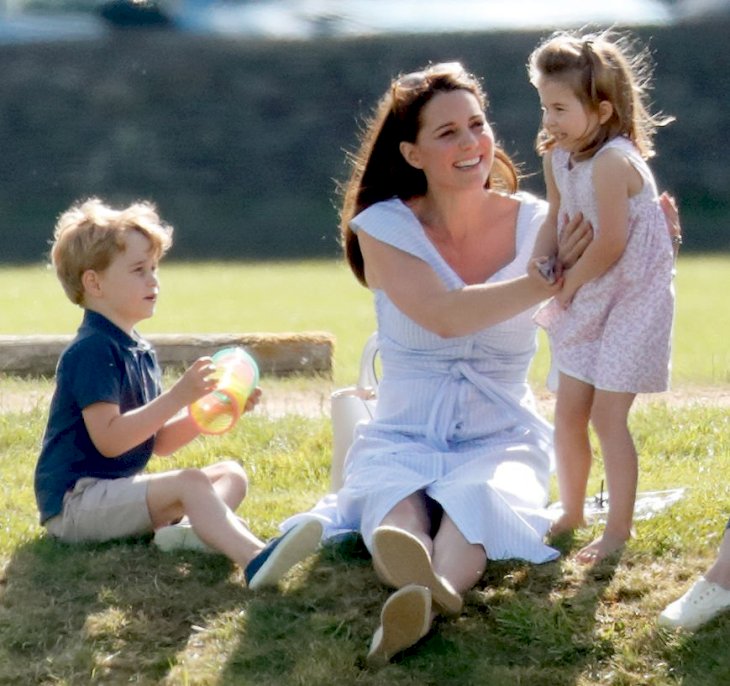 Image Credit: Getty Images / Prince George of Cambridge, Catherine, Duchess of Cambridge and Princess Charlotte of Cambridge in 2018.