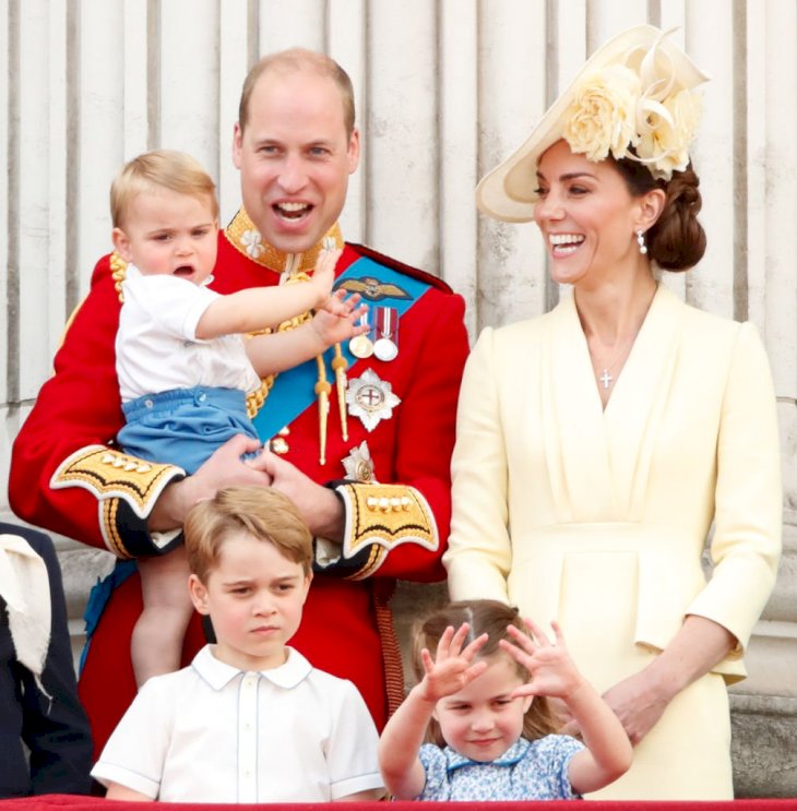 Image Credit: Getty Images / Prince William, Duke of Cambridge, Catherine, Duchess of Cambridge, Prince Louis of Cambridge, Prince George of Cambridge and Princess Charlotte of Cambridge watch a flypast from the balcony of Buckingham Palace.
