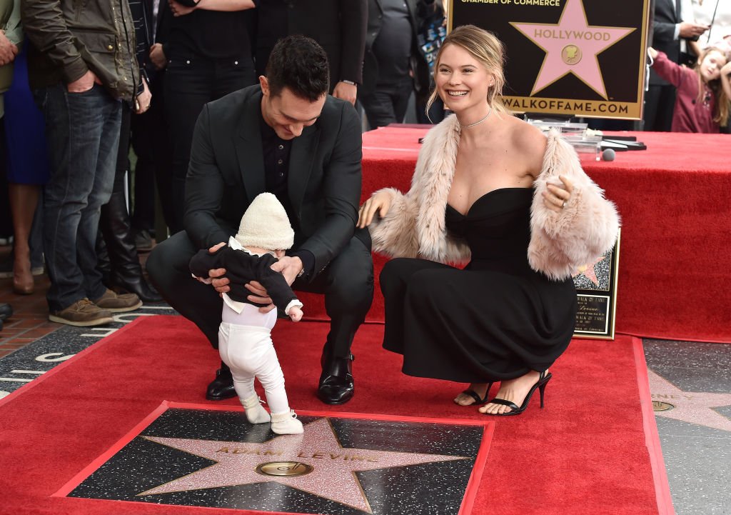 Image Credit: Getty Images / Adam Levine, model Behati Prinsloo and daughter Dusty Rose Levine attend the ceremony honoring Adam Levine with star on the Hollywood Walk of Fame on February 10, 2017.