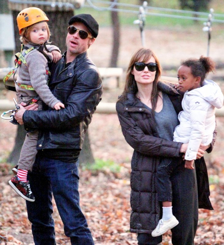 Image Credit: Shutterstock.com/Northfoto | Brad Pitt and Angelina Jolie take their children Pax, Zahara and Shiloh to a park in Budapest