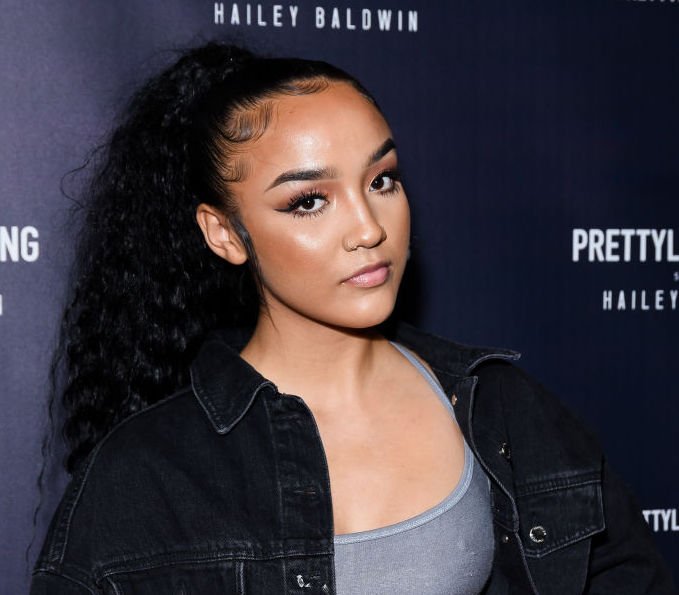 Image Credit: Getty Images / Lexii Alijai attends PrettyLittleThing X Hailey Baldwin in West Hollywood, California.