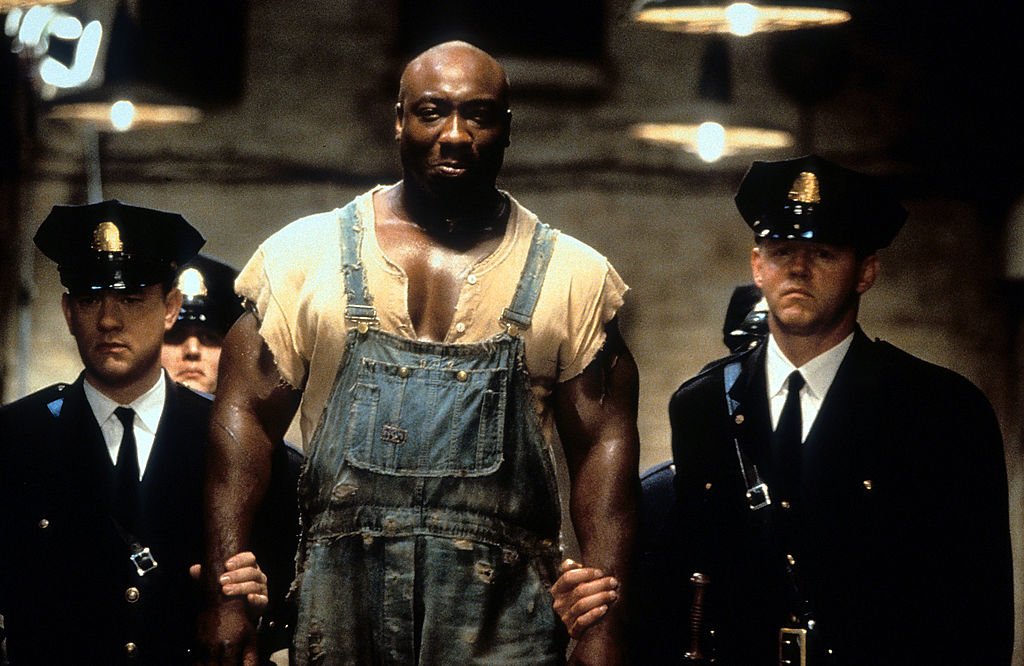 Image Credit: Getty Images / Michael Clarke Duncan is walked down a hall in a scene from the film 'The Green Mile', 1999. Image Credit: Getty Images / Michael Clarke Duncan is walked down a hall in a scene from the film 'The Green Mile', 1999.