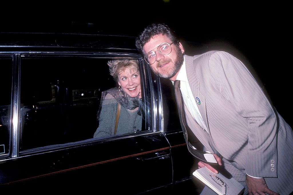 Image Credits: Getty Images / Ron Galella / Ron Galella Collection | Actress Elizabeth Montgomery and actor Robert Foxworth on May 22, 1985 outside Le Parker Meridian in New York City. Image Credits: Getty Images / Ron Galella / Ron Galella Collection | Actress Elizabeth Montgomery and actor Robert Foxworth on May 22, 1985 outside Le Parker Meridian in New York City.