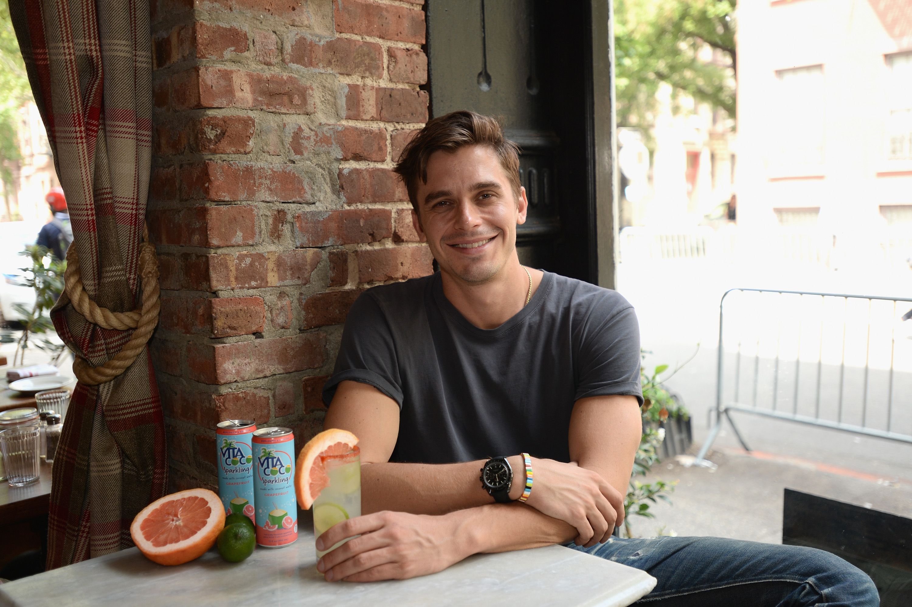 Antoni Porowski enjoying a drink on a hot day / Getty Images Antoni Porowski enjoying a drink on a hot day / Getty Images