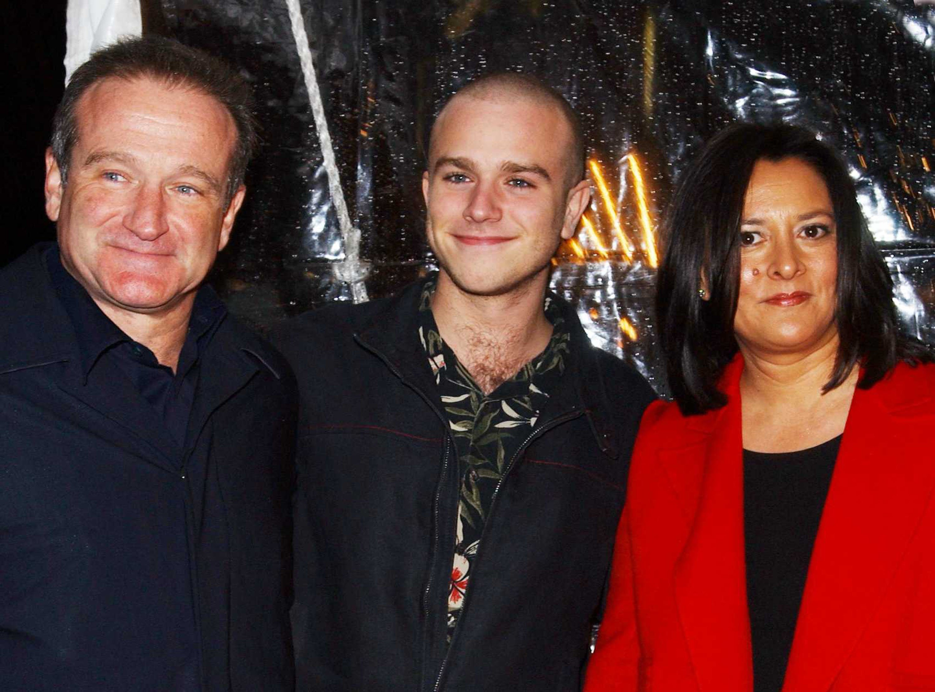 Image Credits: Getty Images / Arnaldo Magnani | Actor Robin Williams, his son Zak, and his wife Marcia Garces arrive for the premiere of the film "Death to Smoochy" March 26, 2002 in New York City. Image Credits: Getty Images / Arnaldo Magnani | Actor Robin Williams, his son Zak, and his wife Marcia Garces arrive for the premiere of the film "Death to Smoochy" March 26, 2002 in New York City.