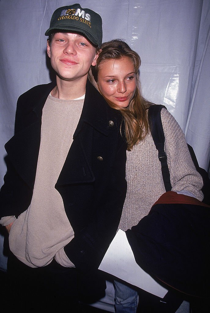 Image Source: Getty Images/Dave Allocca| Actor Leonardo DiCaprio w. model Bridget Hall.