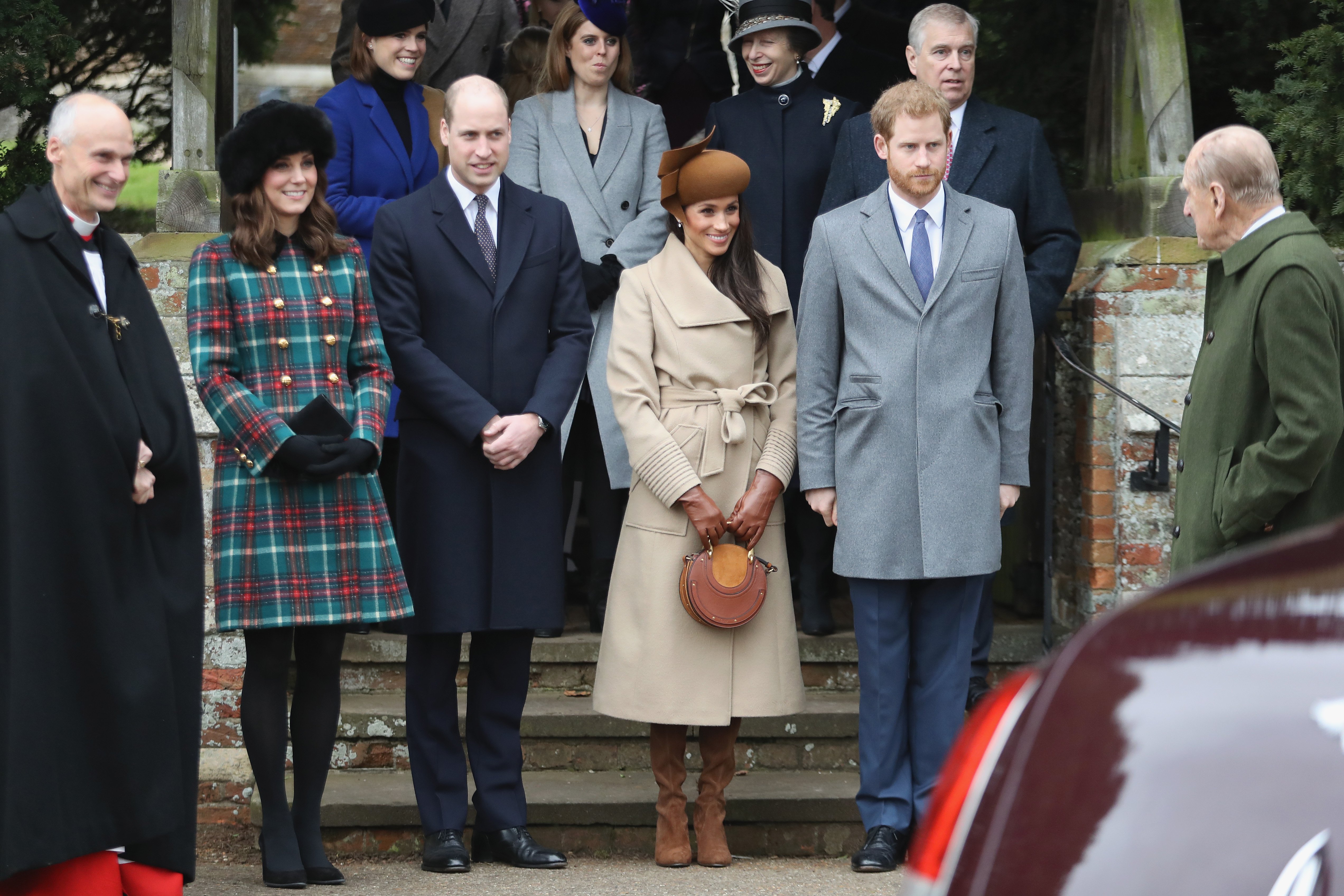 Image Source: Getty Images/ Prince William and Prince Harry with their wives