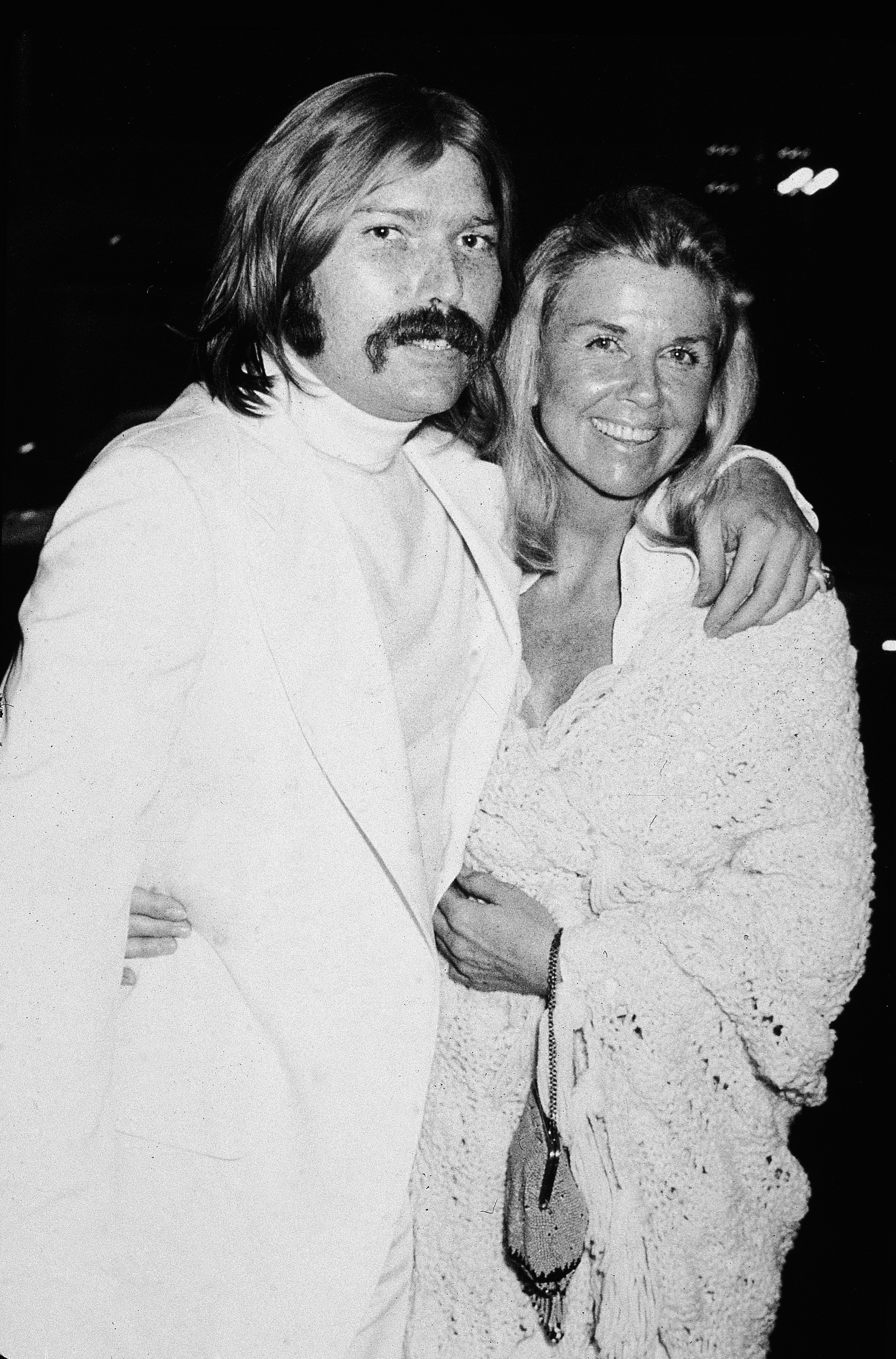 Image Credits: Getty Images / Hulton Archive | American actress Doris Day with her son, American rock producer and songwriter Terry Melcher (1942 - 2004), early 1970s. Melcher also served as the executive producer of his mother's television series 'The Doris Day Show' from 1968 - 1972.