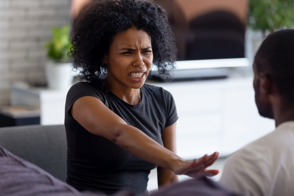 Woman screams at man during fight | Shutterstock Woman screams at man during fight | Shutterstock