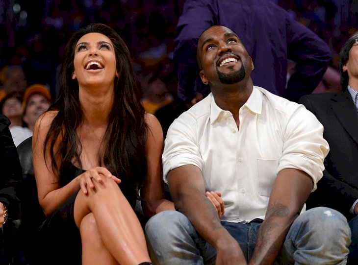Image Credit: Getty Images / Kanye West and Kim Kardashian attend an event.