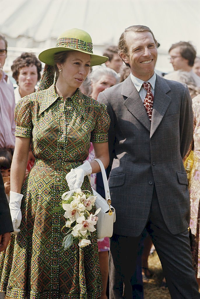 Image Credits: Getty Images / Tim Graham Photo Library | Princess Anne, the Princess Royal and her husband Mark Phillips attend a garden fete at Great Somerford, Wiltshire, 21st June 1975. Image Credits: Getty Images / Tim Graham Photo Library | Princess Anne, the Princess Royal and her husband Mark Phillips attend a garden fete at Great Somerford, Wiltshire, 21st June 1975.