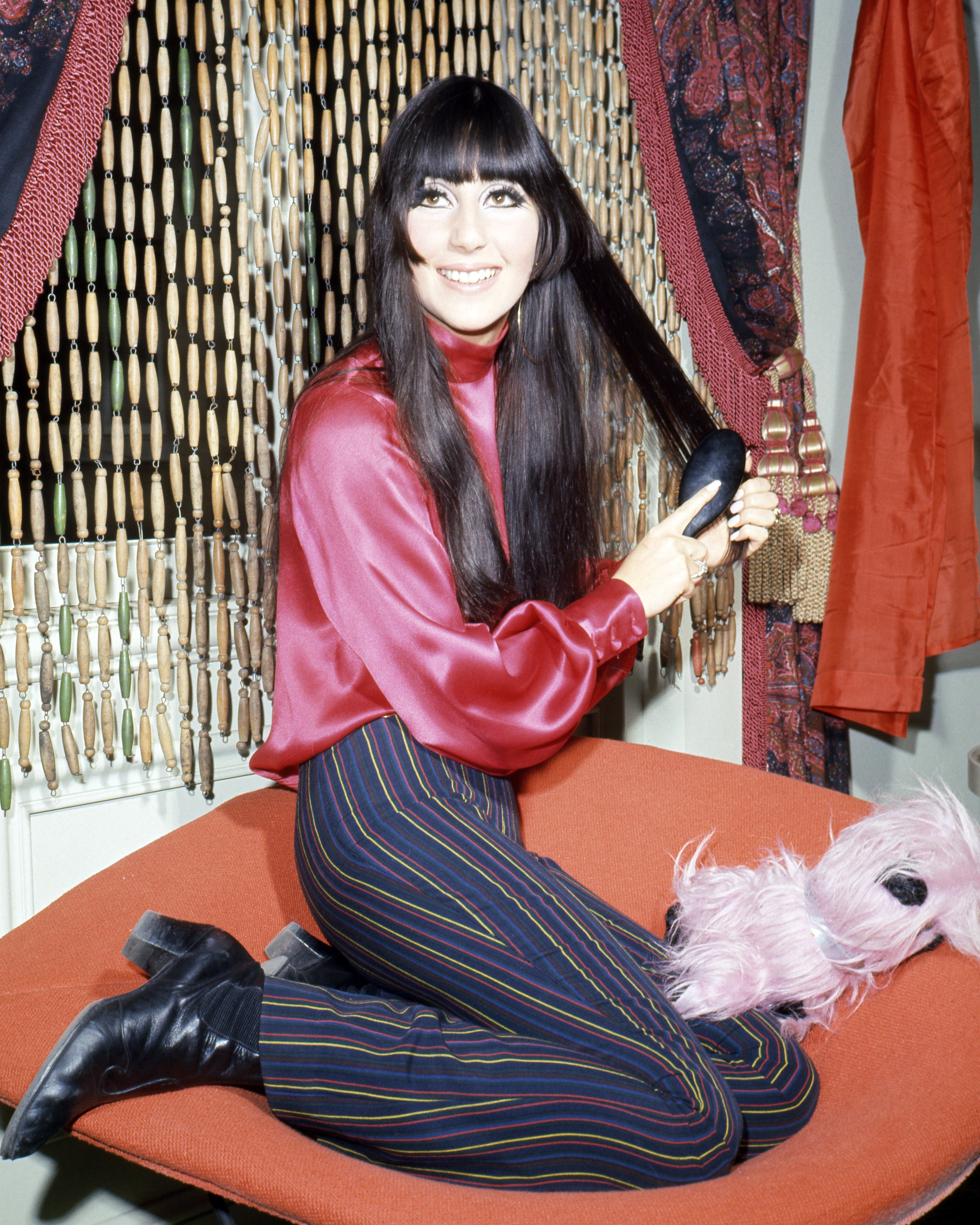 Image Source: Getty Images/Cher with her iconic long black hair Image Source: Getty Images/Cher with her iconic long black hair