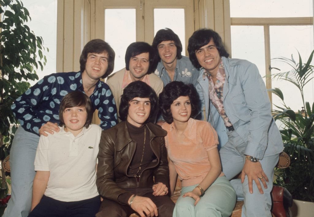 Image Credit: Getty Images / The Osmonds, known as the first family of pop, featuring Jimmy, Donny Marie, Alan, Wayne, Merrill and Jay Osmond, 1975.