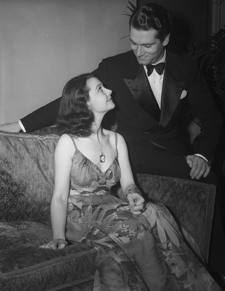 Image Credits: Getty Images / Bettmann | Laurence Olivier admiring Vivien Leigh