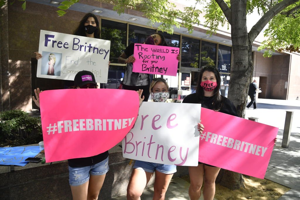 Image Credit: Getty Images / A supporter of Britney Spears gathers with others outside a courthouse in downtown for a #FreeBritney protest as a hearing regarding Spears' conservatorship is in session on July 22, 2020. Image Credit: Getty Images / A supporter of Britney Spears gathers with others outside a courthouse in downtown for a #FreeBritney protest as a hearing regarding Spears' conservatorship is in session on July 22, 2020.