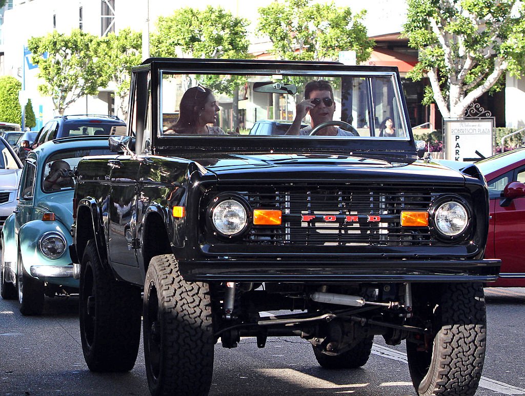 Image Credit: Getty Images / Simon Cowell and Lauren Silverman are seen shopping on October 12, 2013 in Los Angeles, California.