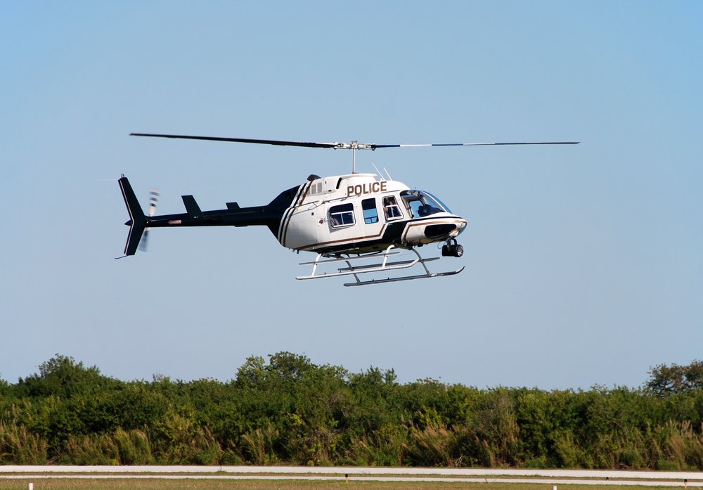 Hovering police helicopter | Shutterstock