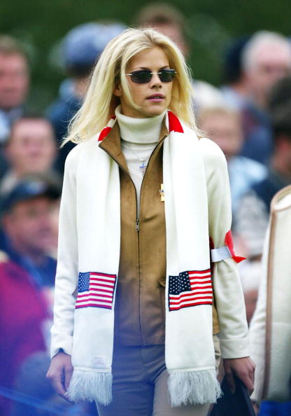 Image Credits: Getty Images / Jamie Squire | Tiger Woods girlfriend model Elin Nordegren watches on the third hole during the morning foursome matches on the second day of the 34th Ryder Cup at the De Vere Belfry in Sutton Coldfield, England on September 28, 2002. Image Credits: Getty Images / Jamie Squire | Tiger Woods girlfriend model Elin Nordegren watches on the third hole during the morning foursome matches on the second day of the 34th Ryder Cup at the De Vere Belfry in Sutton Coldfield, England on September 28, 2002.