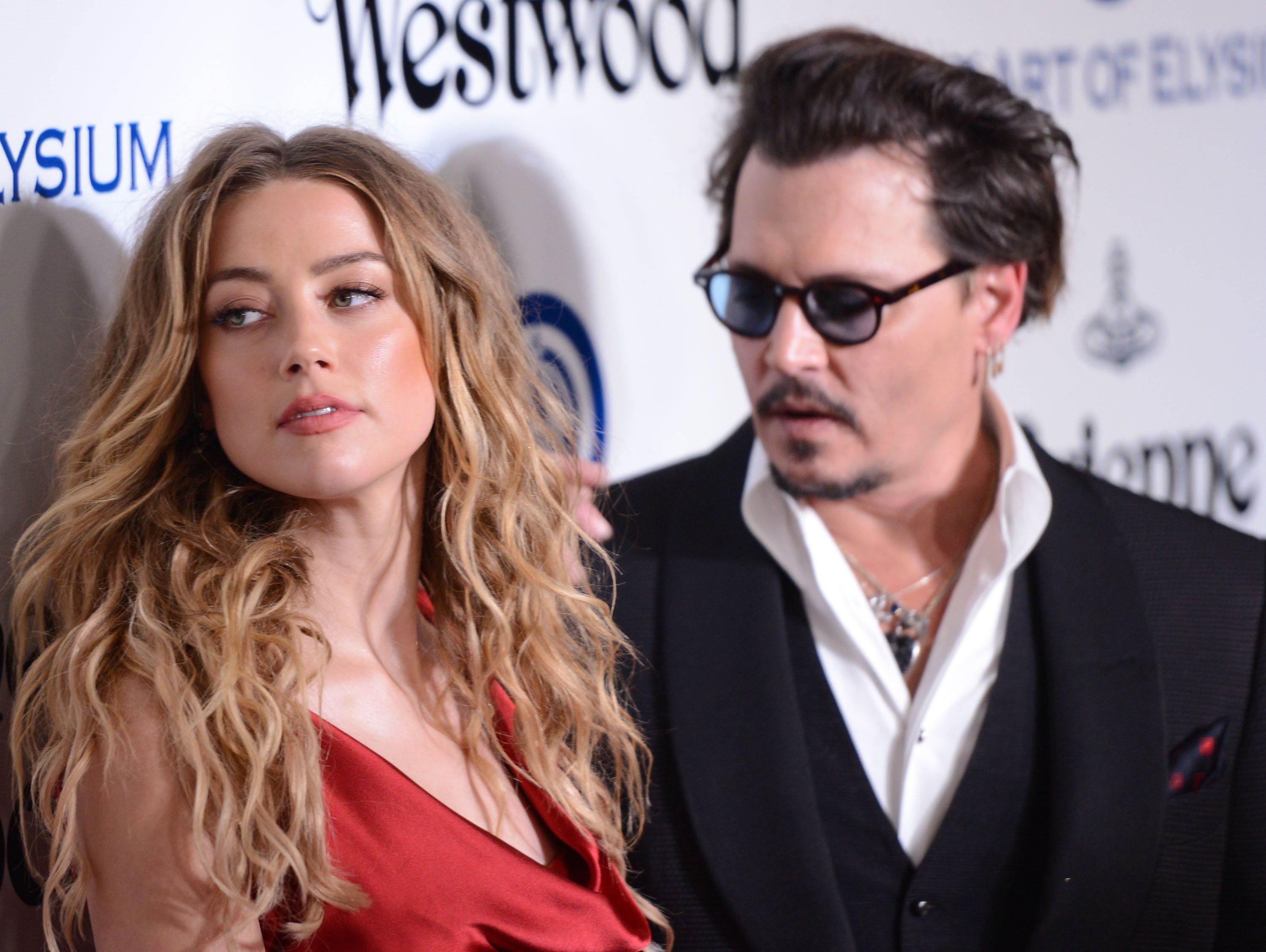 Johnny Depp and Amber Heard / Getty Images