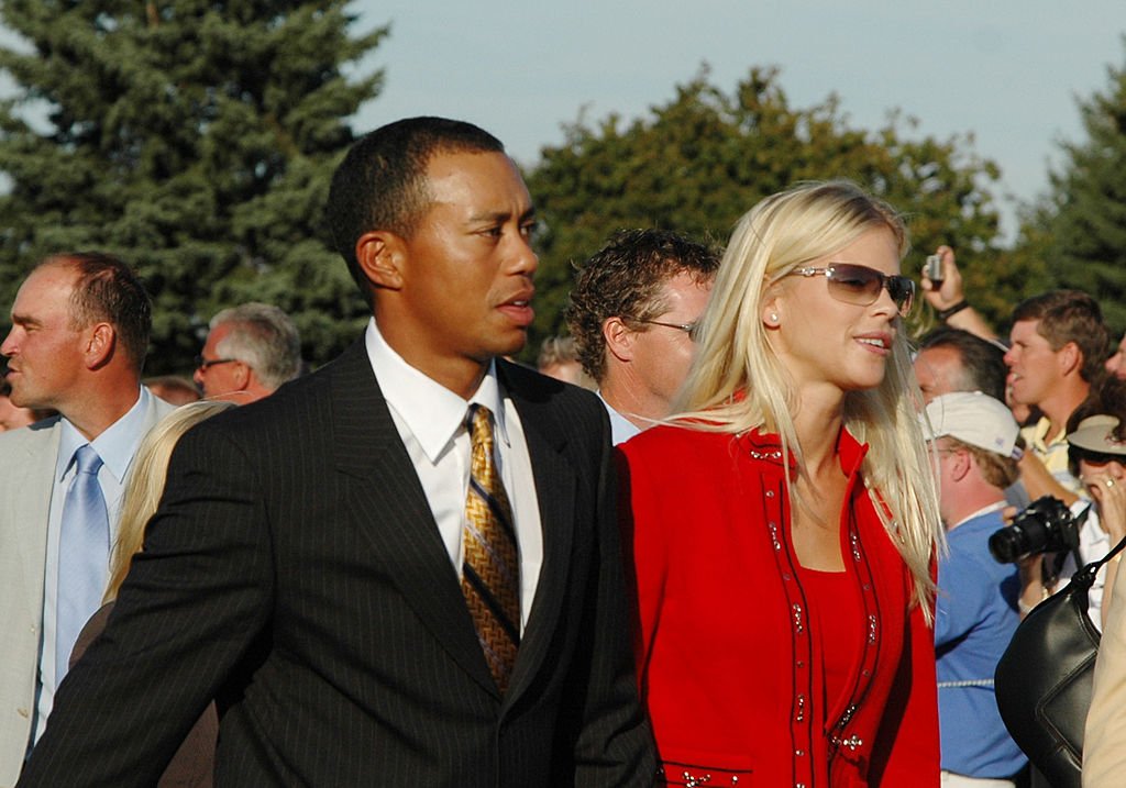 Image Credits: Getty Images / A. Messerschmidt | Tiger Woods and his girlfriend, Elin Nordegren, leave the stage after opening ceremonies at the 2004 Ryder Cup in Detroit, Michigan, September 16, 2004. Image Credits: Getty Images / A. Messerschmidt | Tiger Woods and his girlfriend, Elin Nordegren, leave the stage after opening ceremonies at the 2004 Ryder Cup in Detroit, Michigan, September 16, 2004.